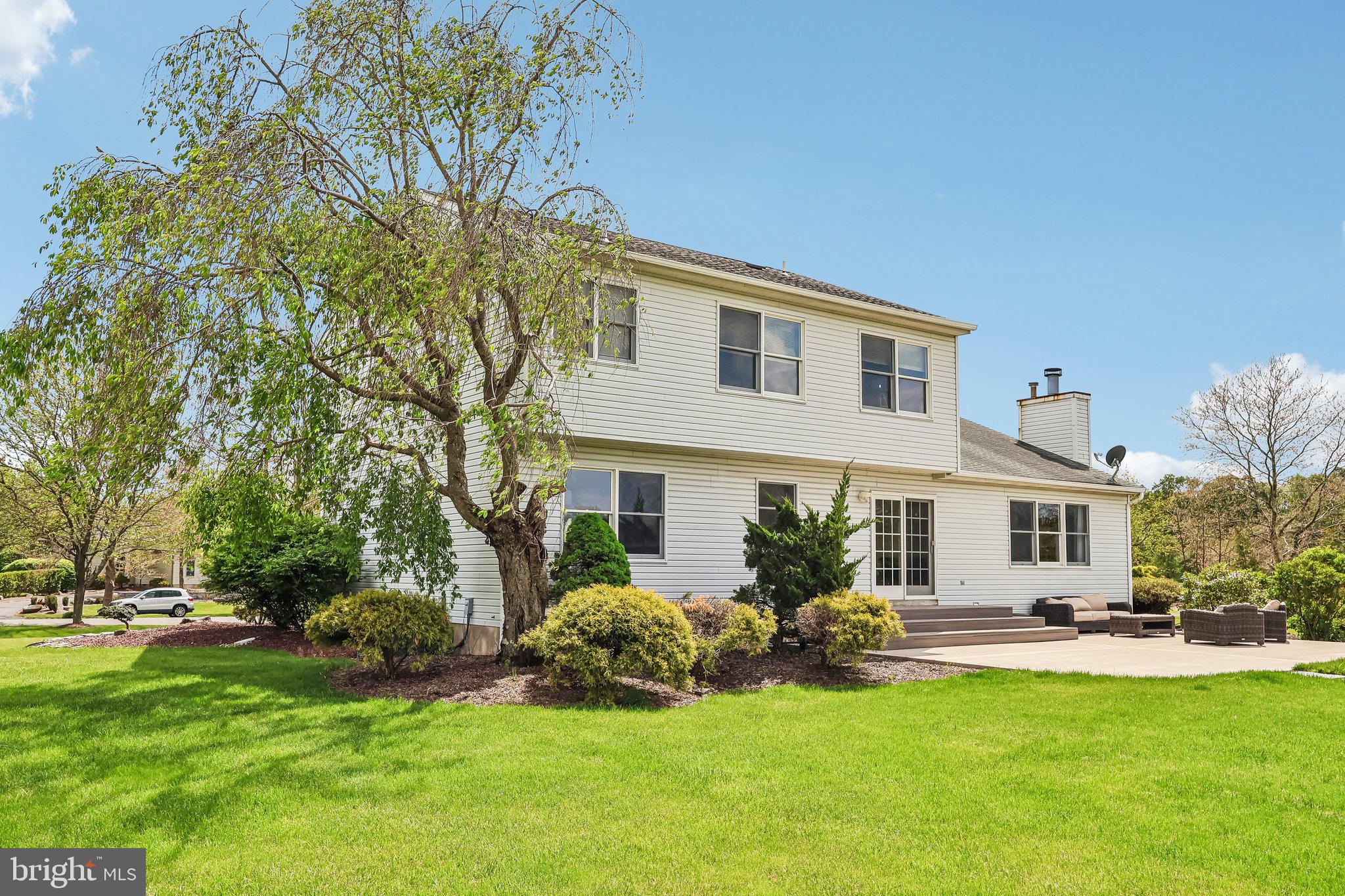 2 Carney Way Hamilton, NJ 08620 - Photo 53 of 72 a front view of a house with a garden and plants