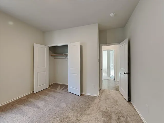 an empty room with closet