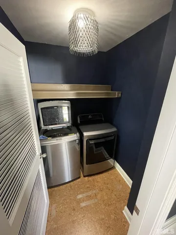 a kitchen with a stove and a microwave