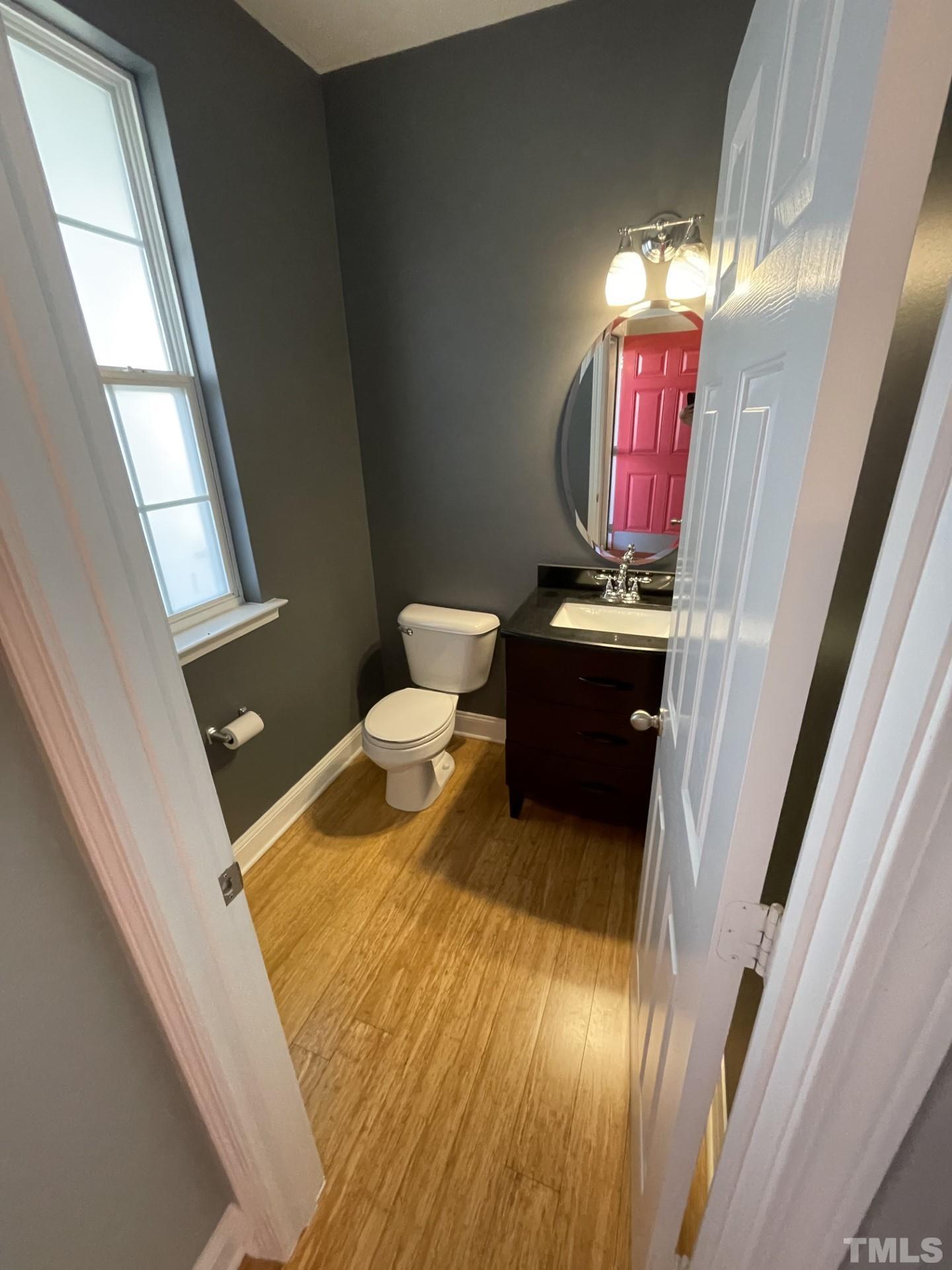 152 Solheim Lane Raleigh, NC 27603 - Photo 22 of 25 a bathroom with a sink and a mirror