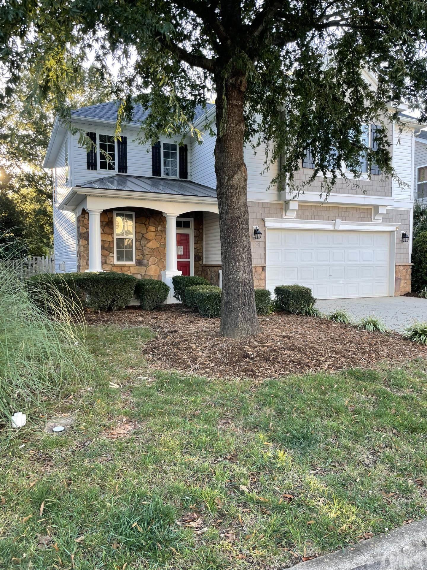 152 Solheim Lane Raleigh, NC 27603 - Photo 3 of 25 a front view of a house with a yard