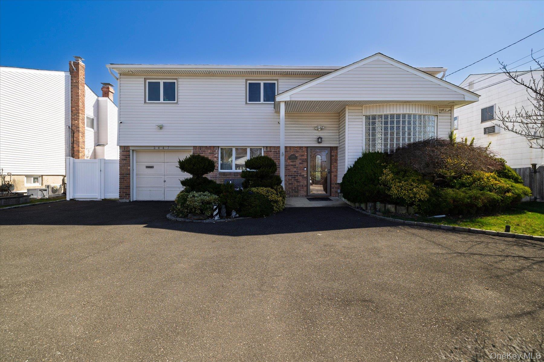 3447 Steven Road Baldwin, NY 11510 - Photo 19 of 23 a view of a house with a outdoor space