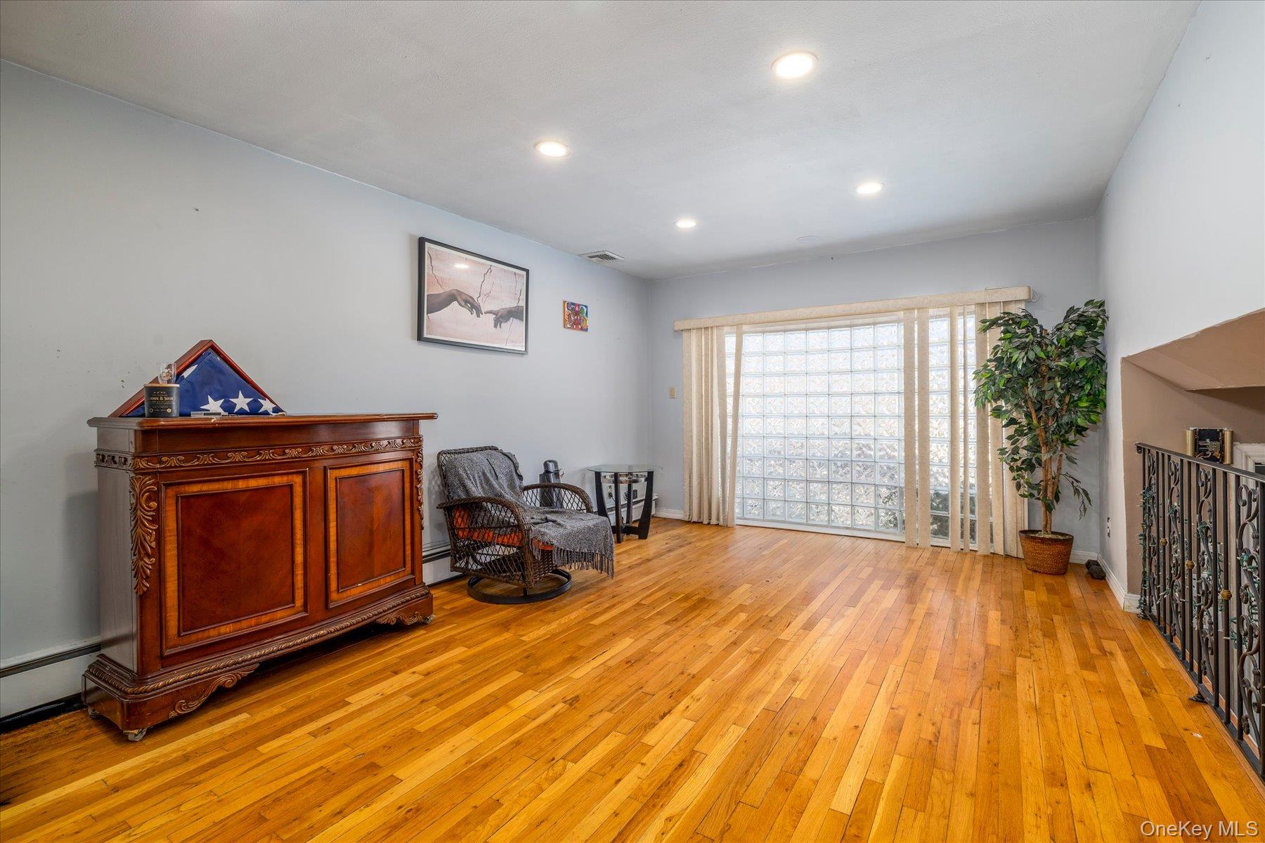 3447 Steven Road Baldwin, NY 11510 - Photo 9 of 23 a bed room with a bed and a window