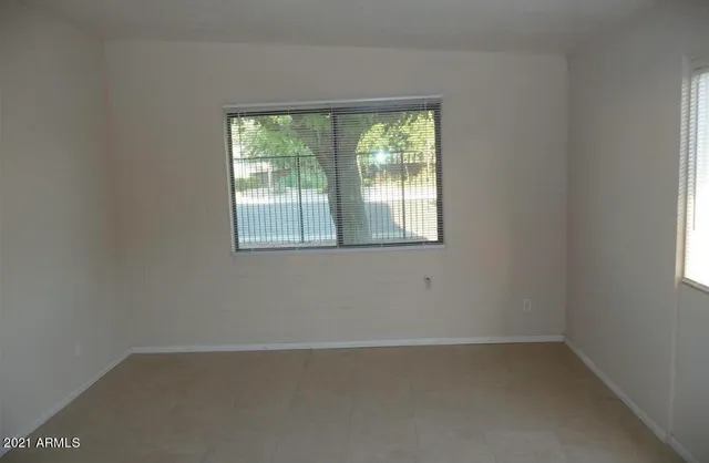 an empty room with a window