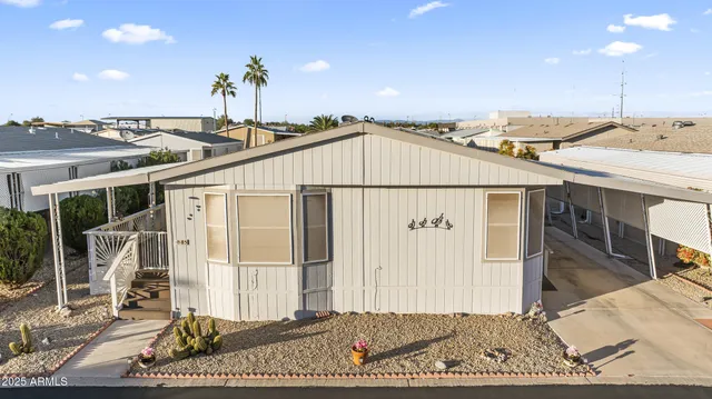 a dinning table and chairs in the patio