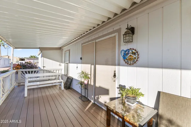 a house view with a tub and wooden floor