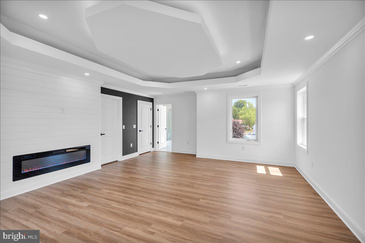 2504 Church Road Cinnaminson, NJ 08077 - Photo 30 of 79 a view of an empty room with window and wooden floor