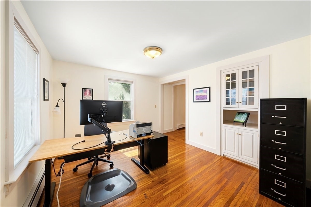 10 2nd Street Natick, MA 01760 - Photo 13 of 31 a view of a workspace with furniture and wooden floor