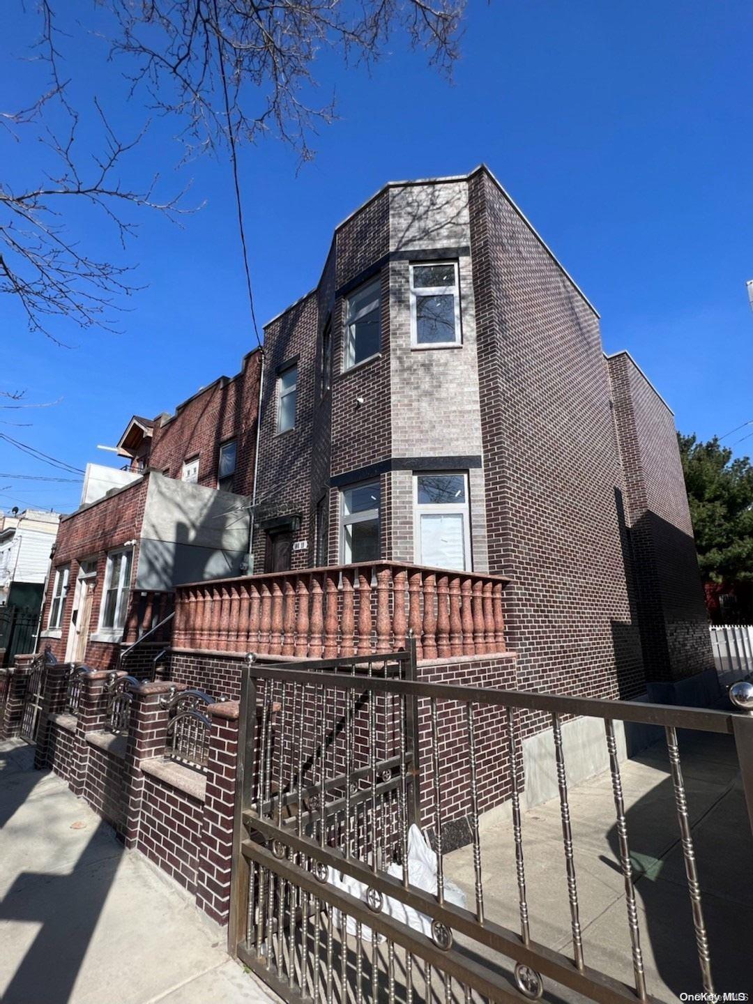 108-19 35th Avenue Queens, NY 11368 - Photo 2 of 7 a front view of a building