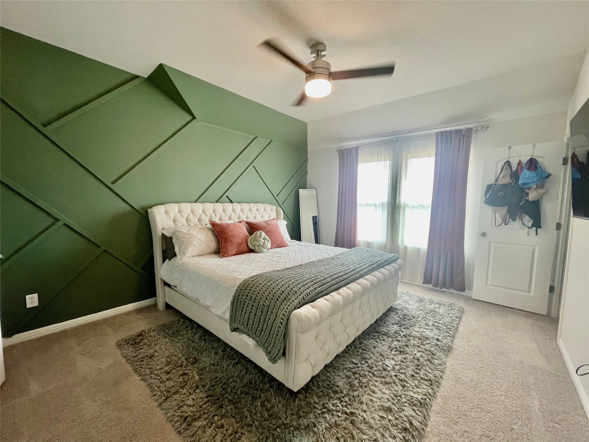 232 Denali Way Dripping Springs, TX 78620 - Photo 18 of 35 Bedroom with carpet floors and a ceiling fan