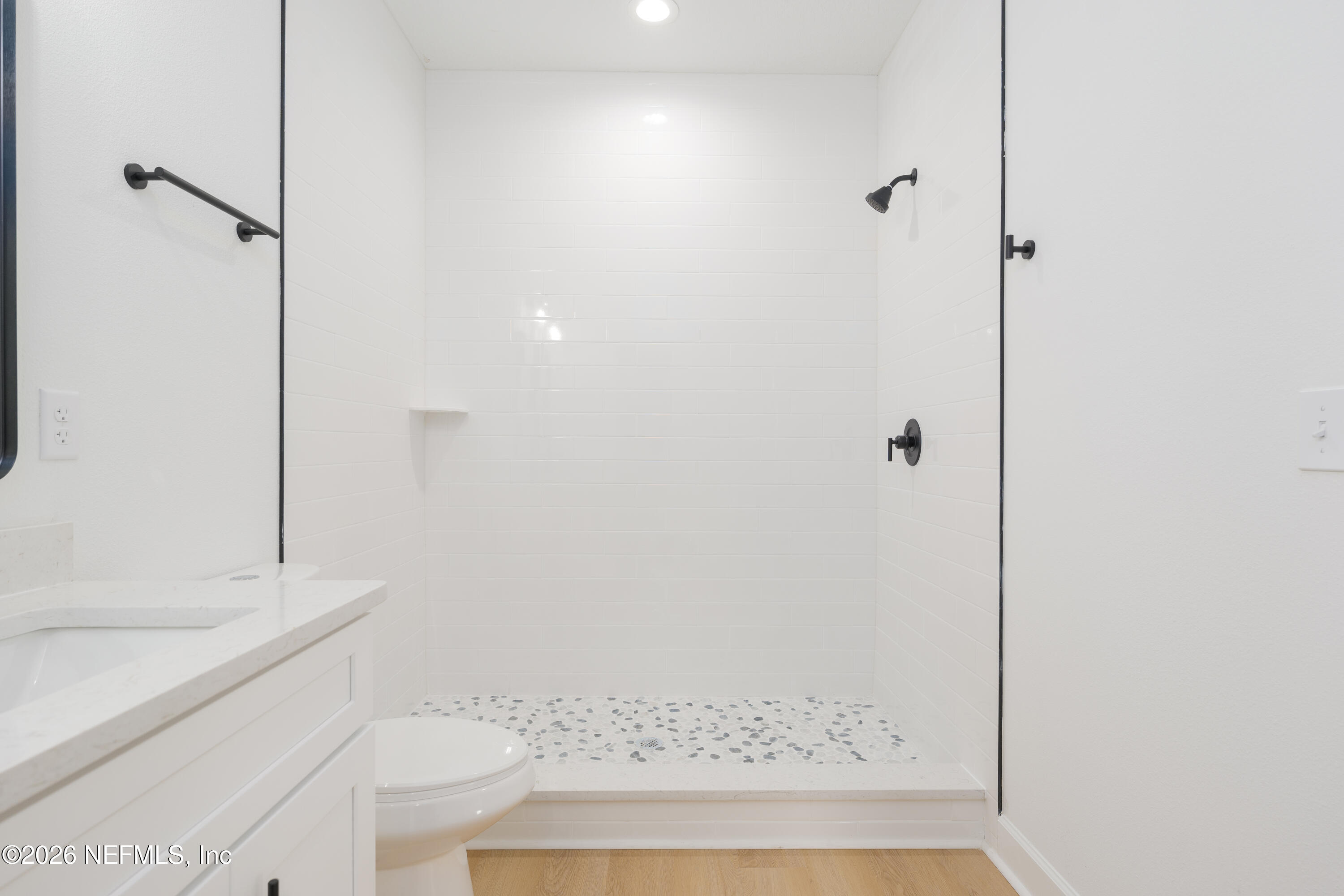 5573 Oregon Trail Middleburg, FL 32068 - Photo 20 of 26 a bathroom with a bathtub and shower