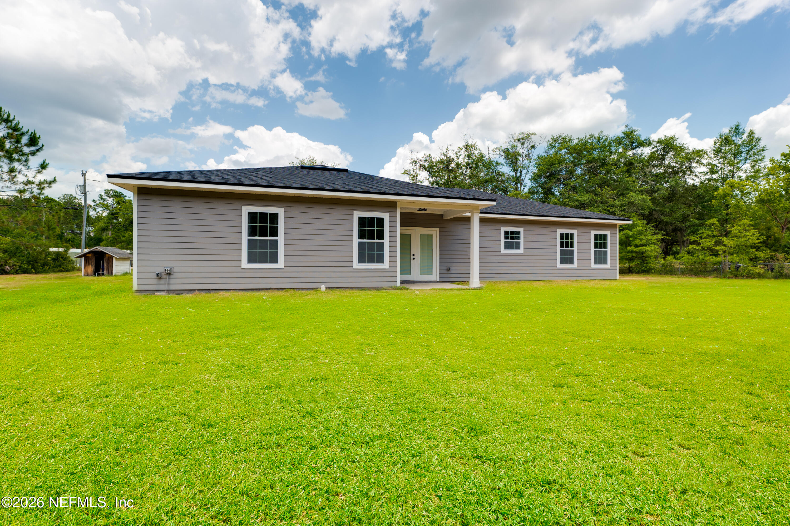 5573 Oregon Trail Middleburg, FL 32068 - Photo 24 of 26 a house view with a garden space
