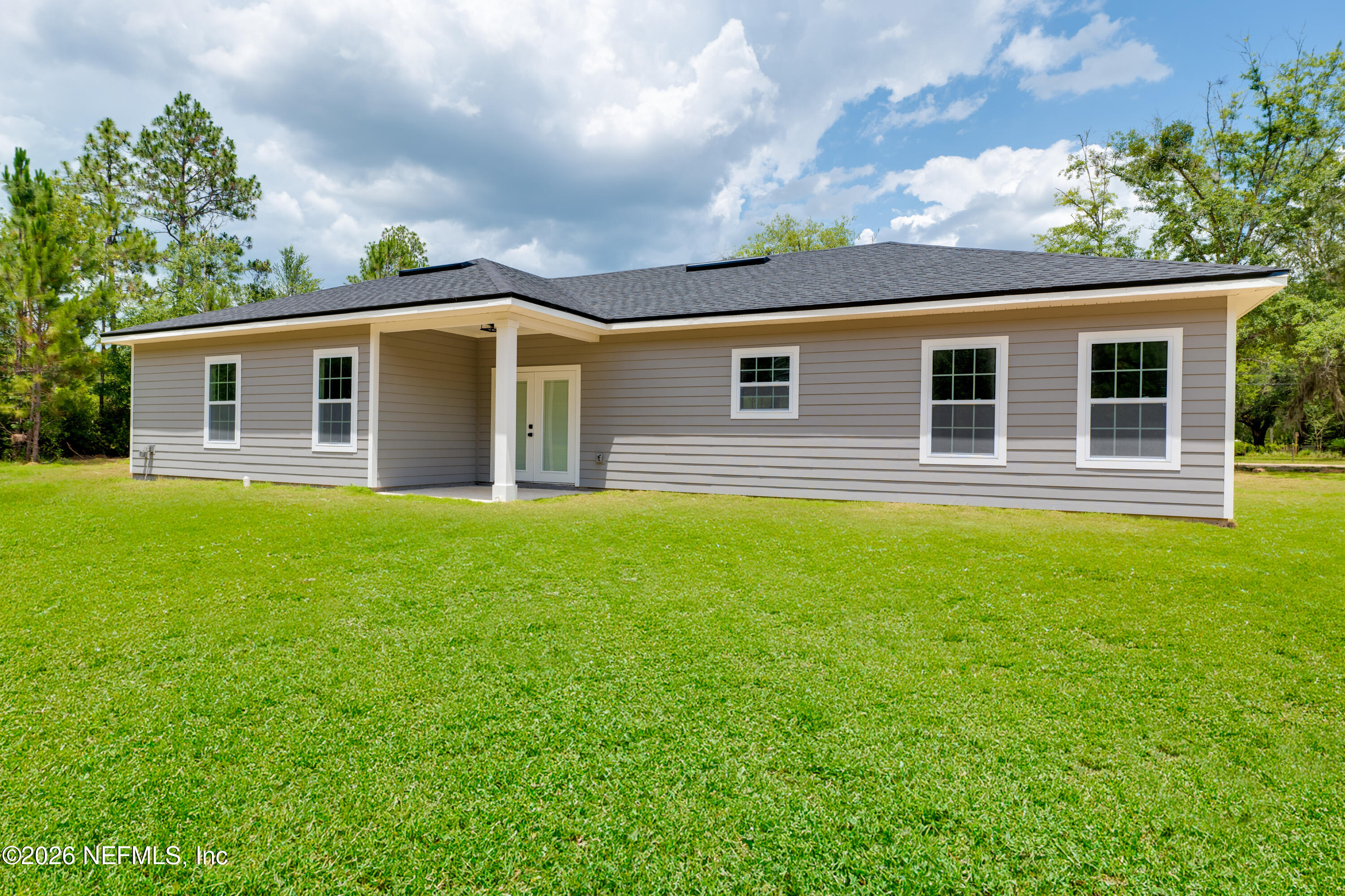 5573 Oregon Trail Middleburg, FL 32068 - Photo 26 of 26 a front view of house with yard and green space