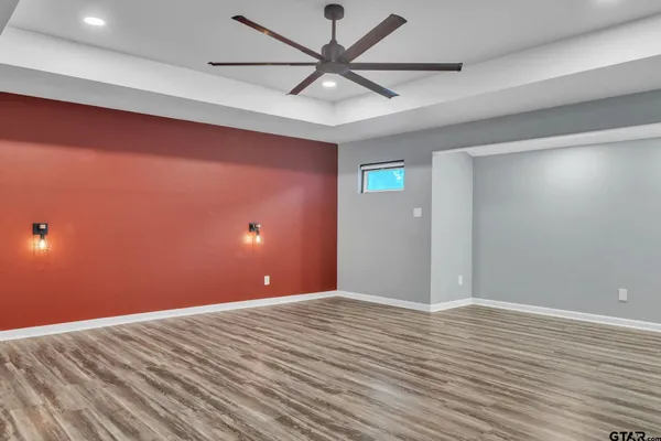 a view of a big room with wooden floor