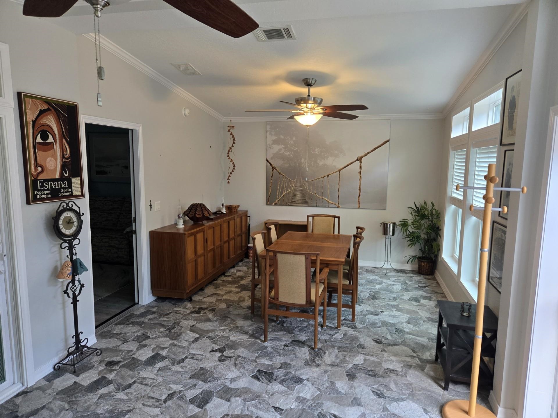 631 Andrew Avenue St. Augustine, FL 32086 - Photo 11 of 20 a view of a dining room with furniture