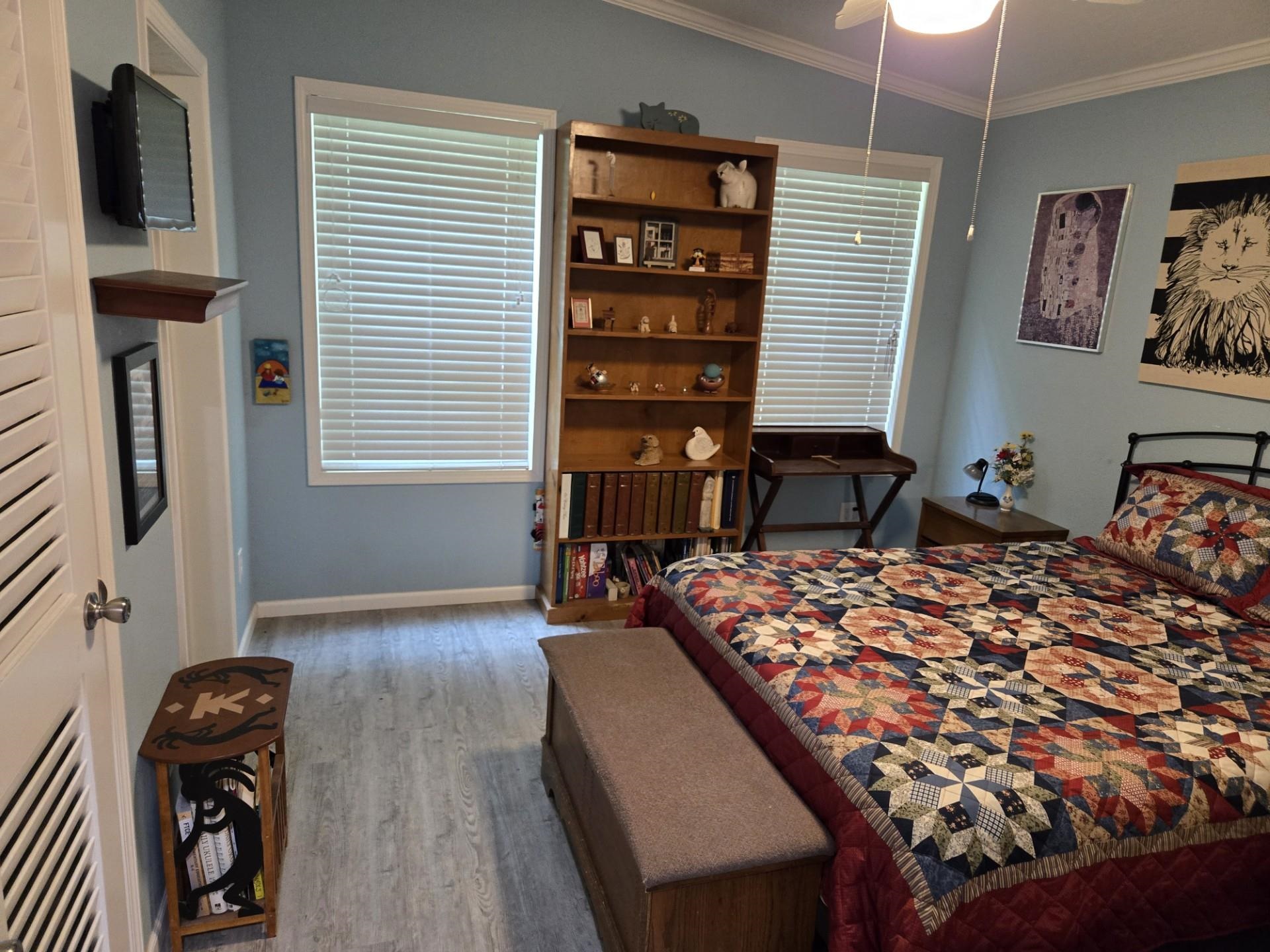 631 Andrew Avenue St. Augustine, FL 32086 - Photo 6 of 20 a bedroom with a bed dresser and a window