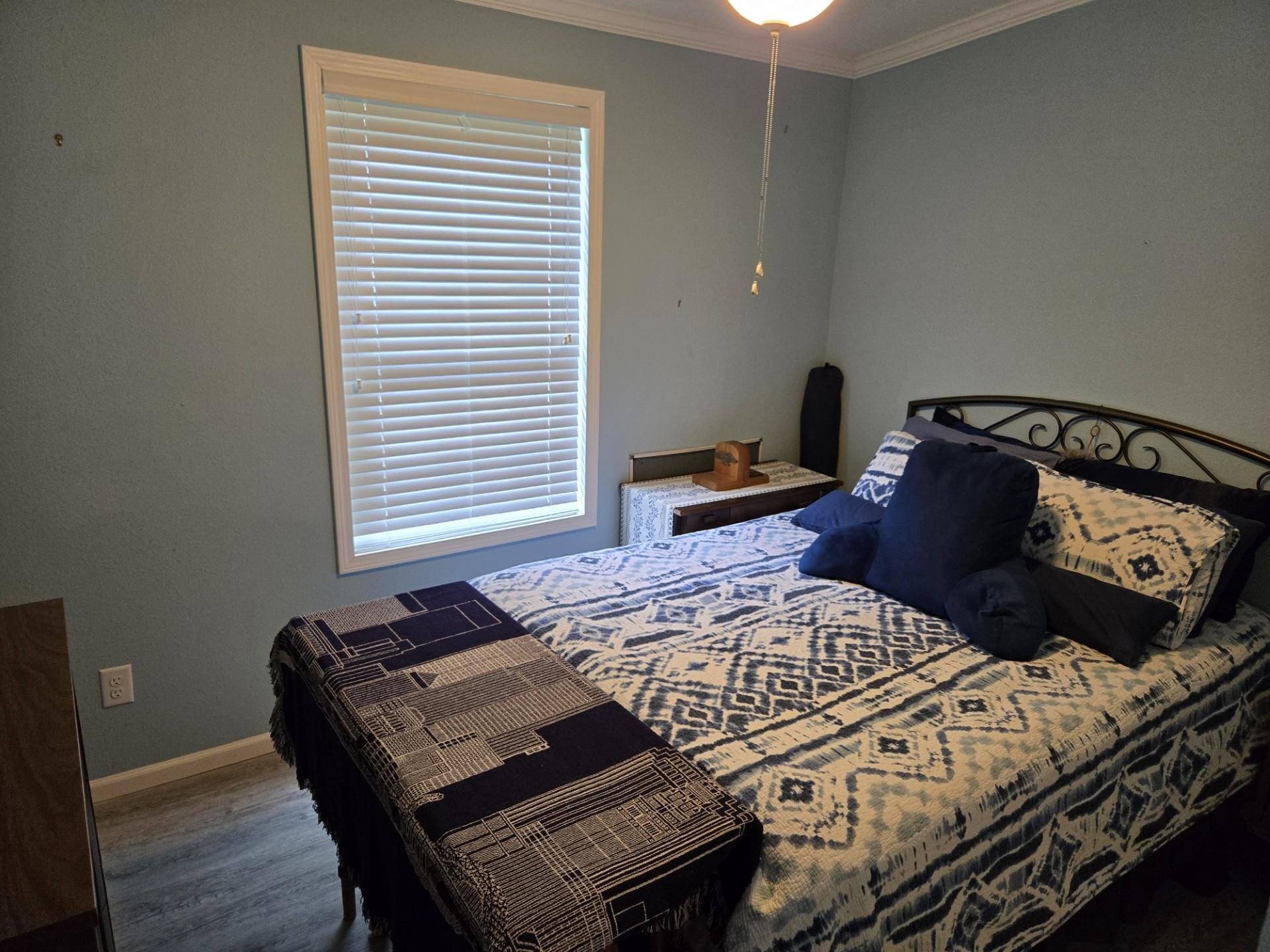 631 Andrew Avenue St. Augustine, FL 32086 - Photo 8 of 20 a bedroom with a bed and a window