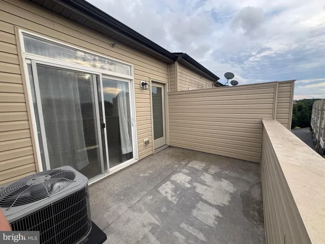 a view of a back yard of the house