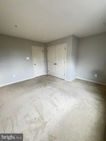 a bathroom with a tub and shower
