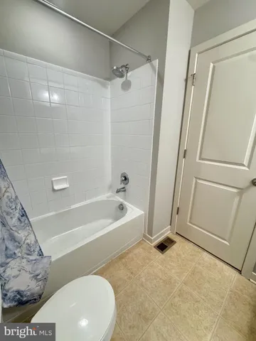 a kitchen with stainless steel appliances granite countertop a sink a stove and cabinets