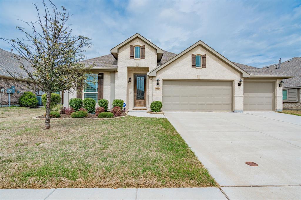 330 Roscoe Drive Fate, TX 75087 - Photo 1 of 1 a front view of a house with garden
