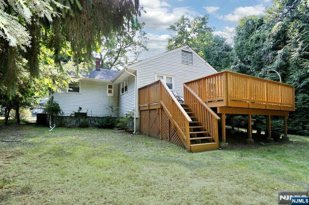 11 Evans Road Cresskill, NJ 07626 - Photo 28 of 31 a view of a house with a yard and sitting area