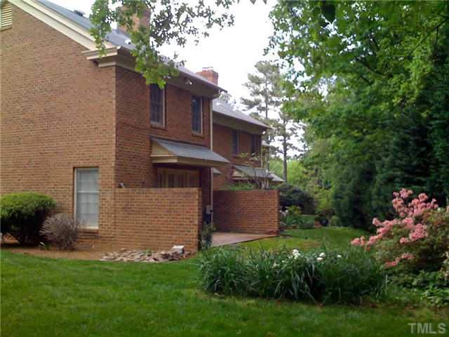 3421 Clark Avenue Raleigh, NC 27607 - Photo 15 of 19 a view of a house with a backyard