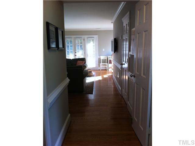3421 Clark Avenue Raleigh, NC 27607 - Photo 17 of 19 a view of a hallway with a white walls