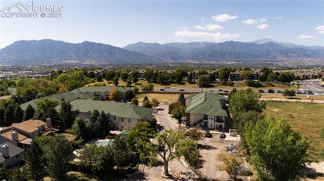 2002 Legacy Ridge View, Unit 201 Colorado Springs, CO 80910 - Photo 32 of 34 Mature Trees and Views