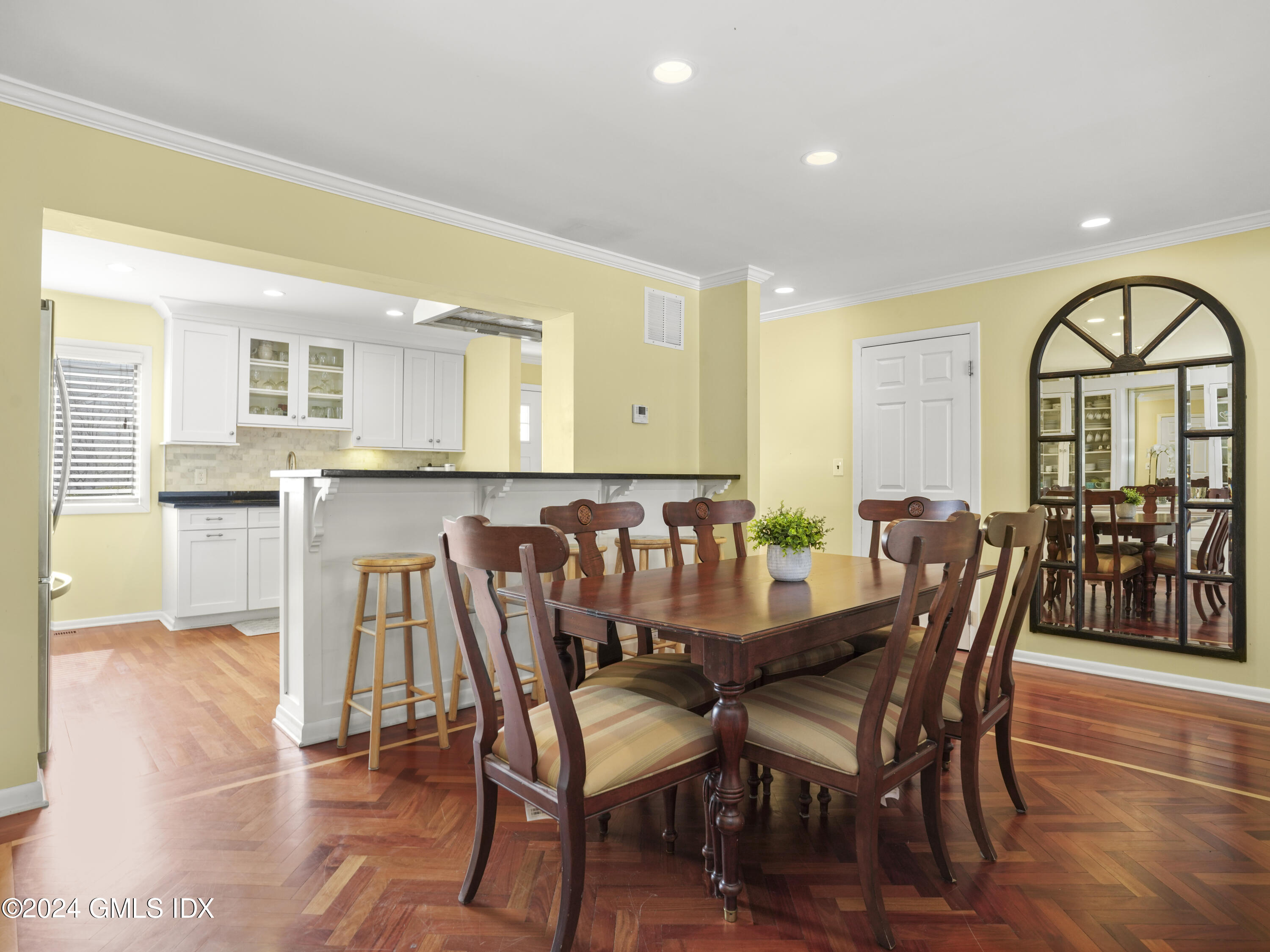 102 Silo Circle, Unit 102 Riverside, CT 06878 - Photo 5 of 22 a view of a dining room with furniture and wooden floor