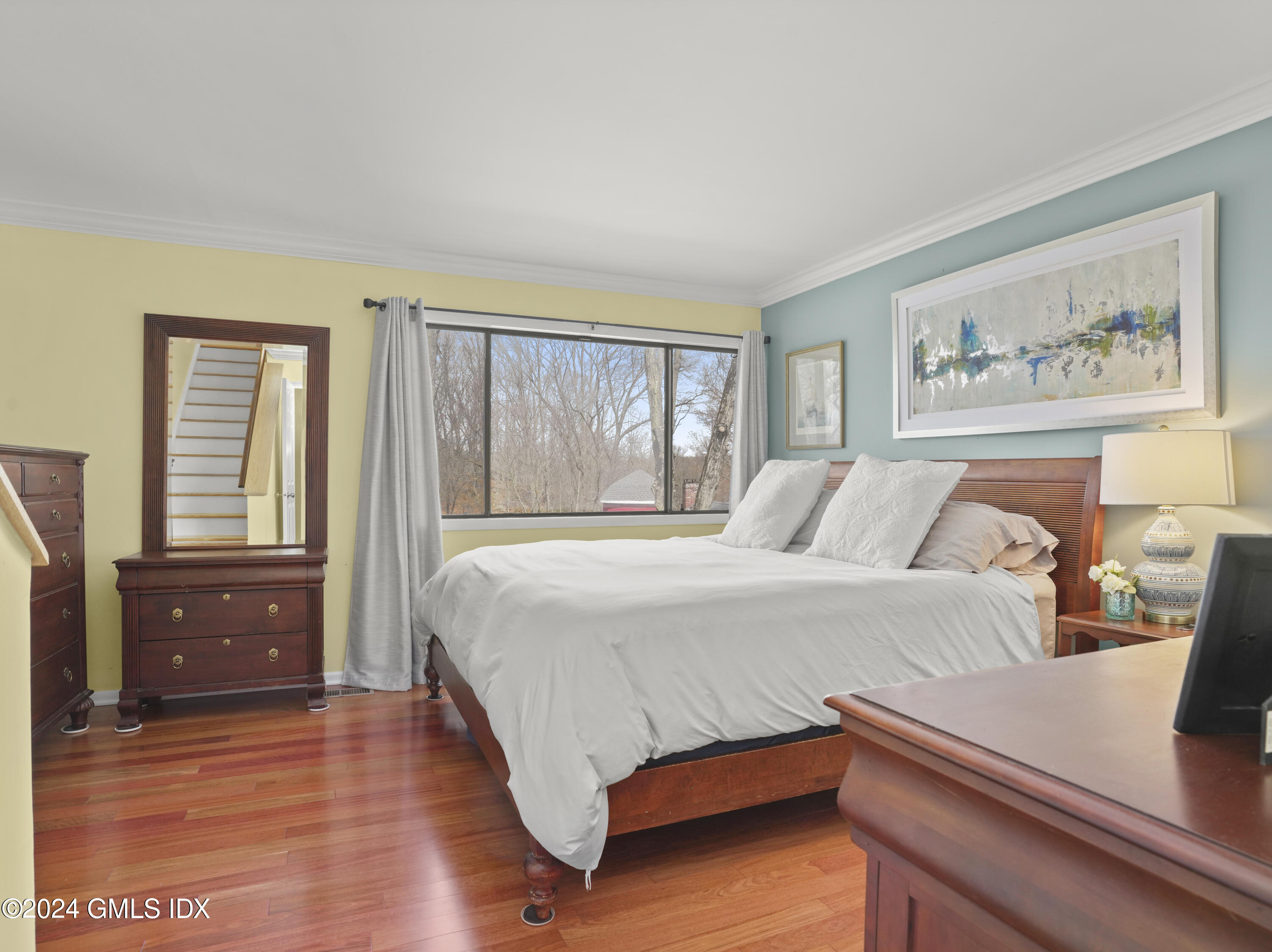 102 Silo Circle, Unit 102 Riverside, CT 06878 - Photo 10 of 22 a bedroom with a bed and a dresser