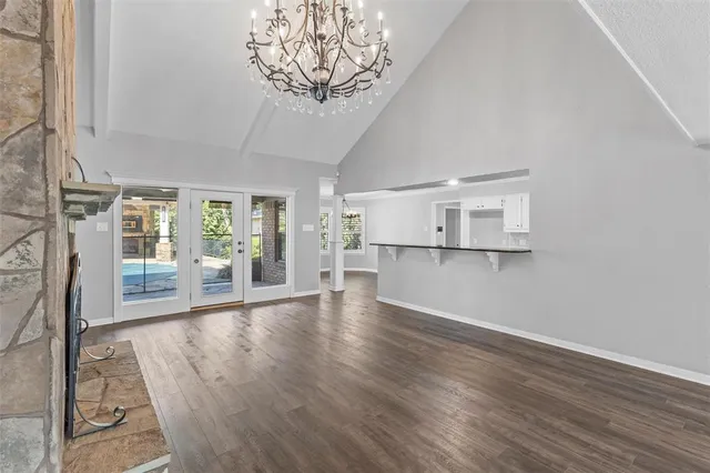a view of a livingroom with wooden floor