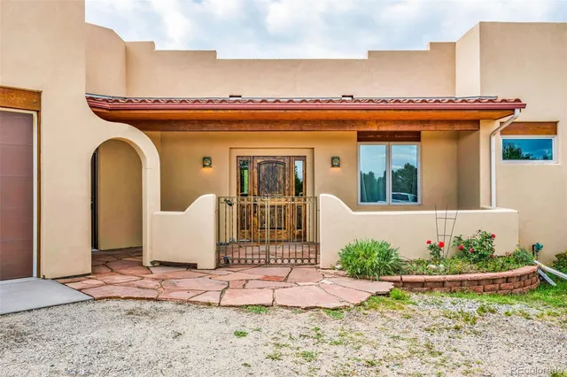 a view of a garden with potted plants