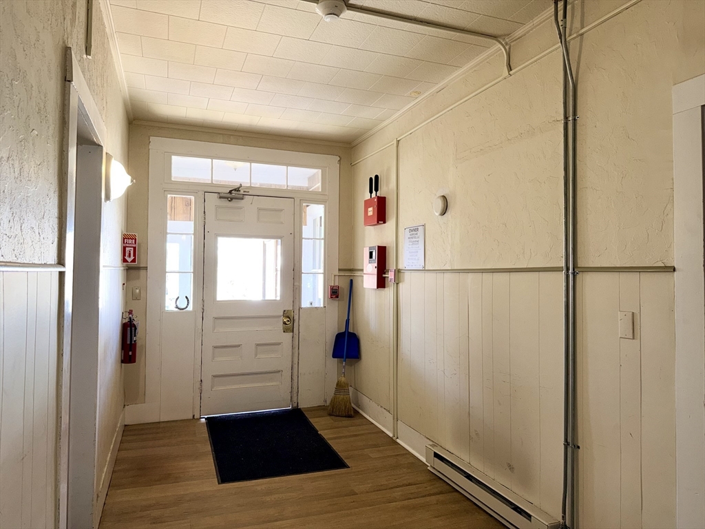 17 Adams Street Easthampton, MA 01027 - Photo 12 of 24 a view of entryway with wooden floor