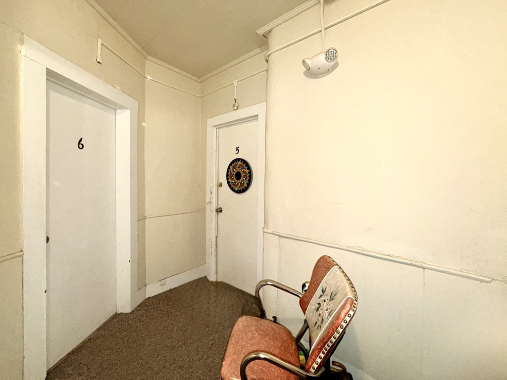 17 Adams Street Easthampton, MA 01027 - Photo 15 of 24 a view of a hallway with seating area