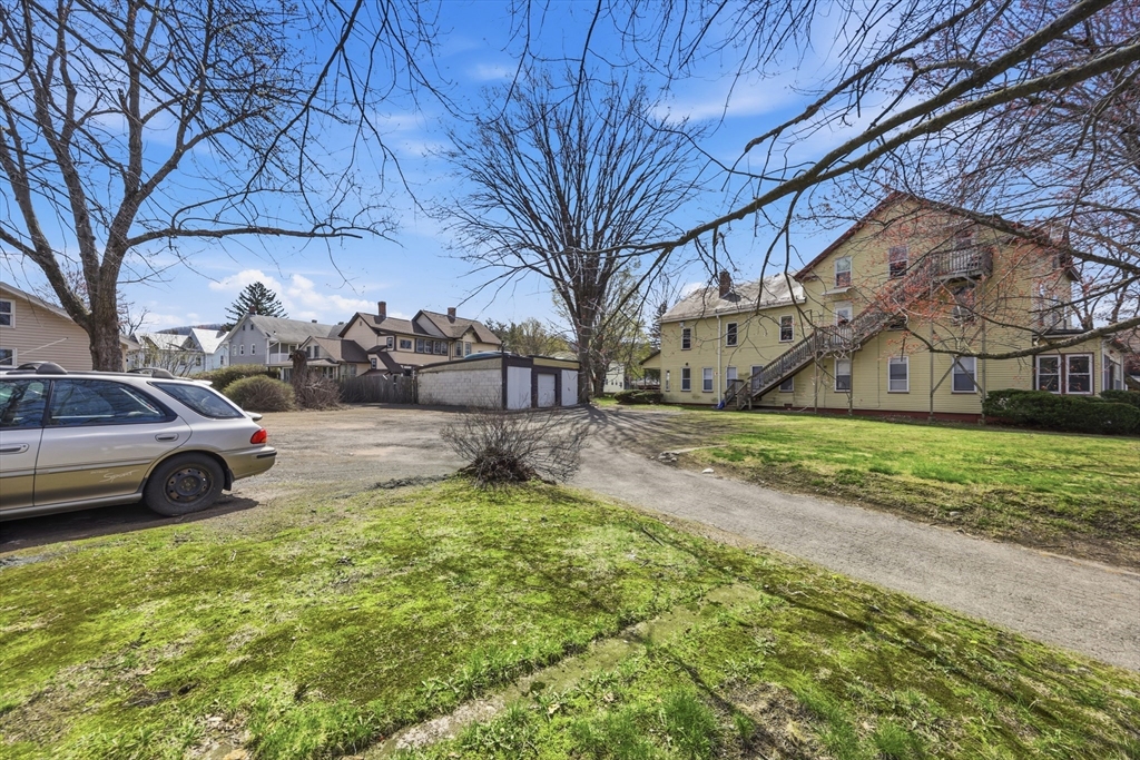17 Adams Street Easthampton, MA 01027 - Photo 21 of 24 a view of a yard with a house