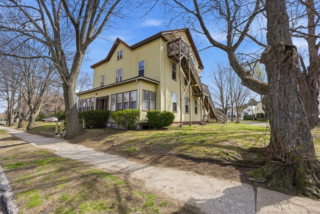 17 Adams Street Easthampton, MA 01027 - Photo 6 of 24 a front view of a house with garden