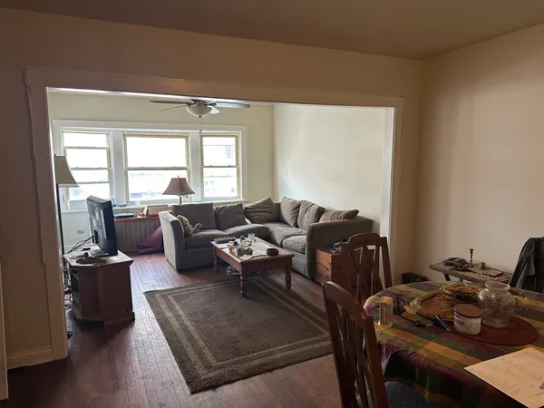 a living room with furniture or couch and a window