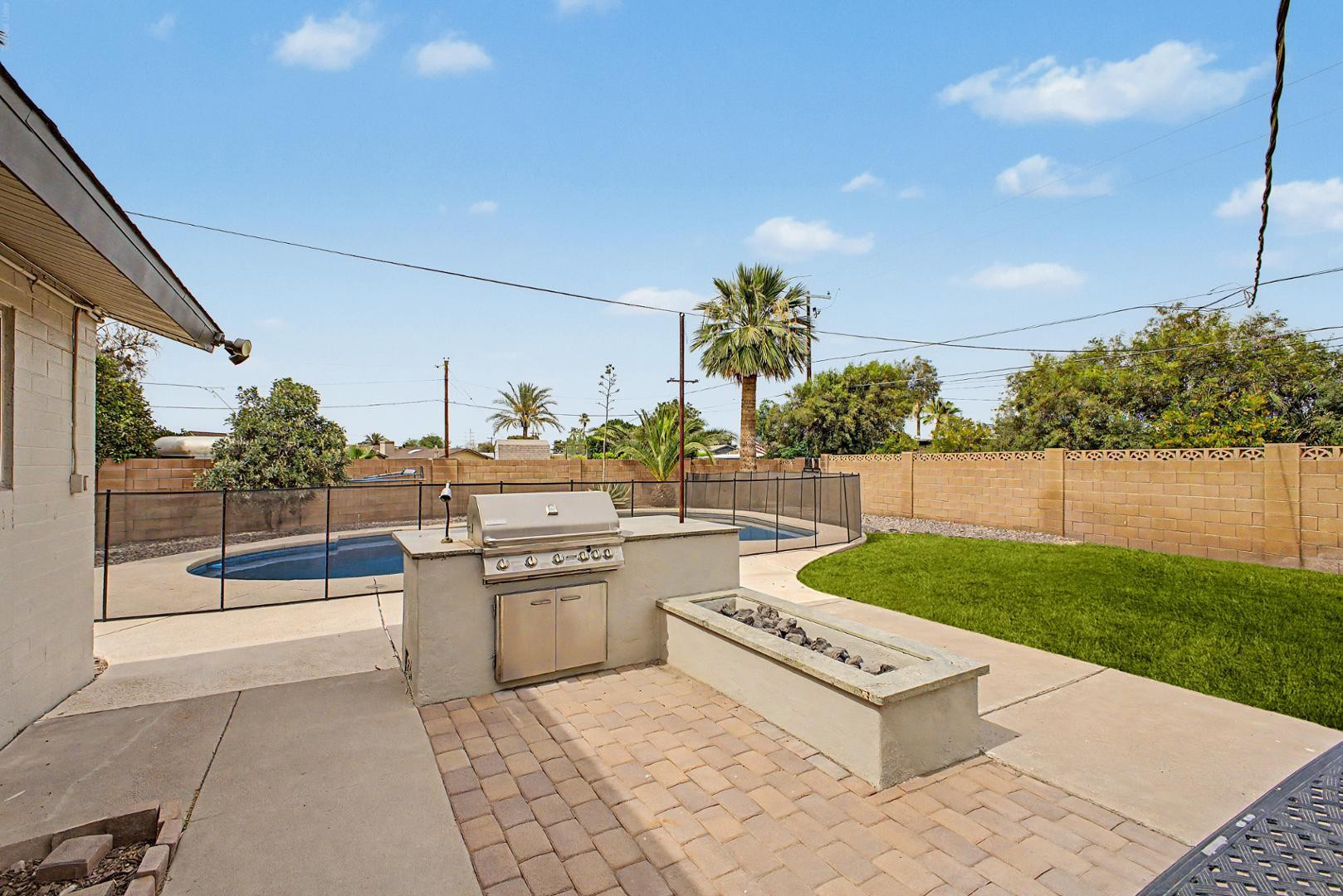 3346 East Cochise Road Phoenix, AZ 85028 - Photo 36 of 40 a view of a patio with a yard