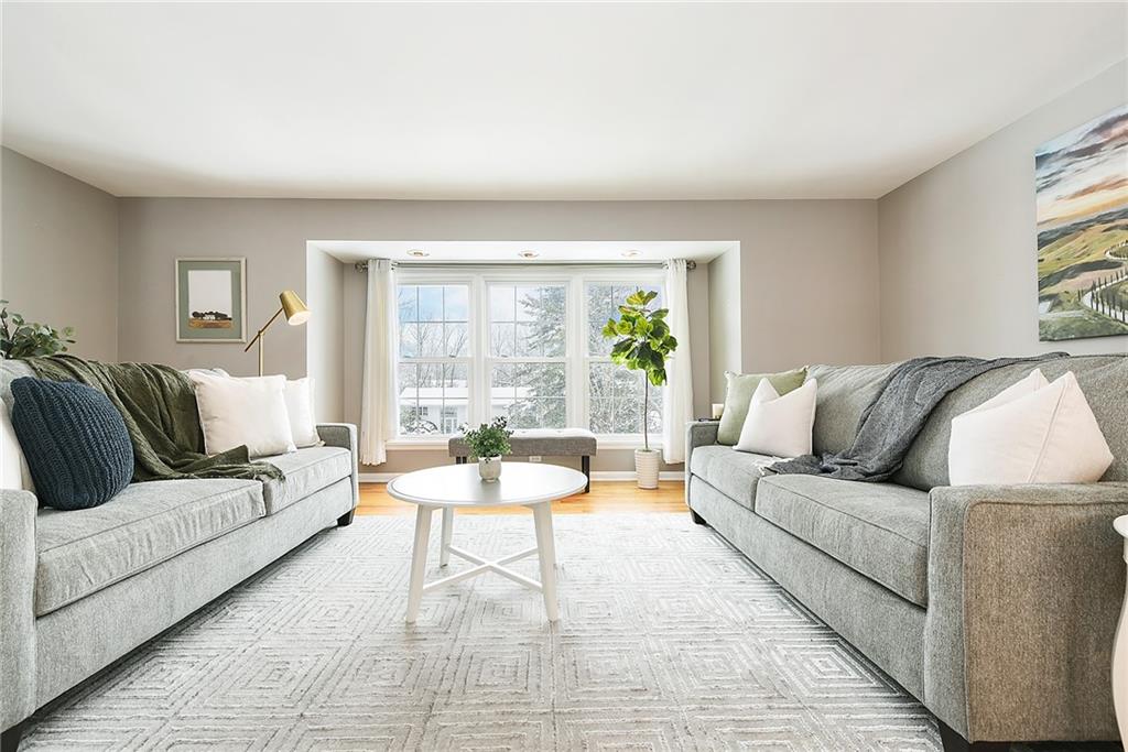 1608 Seegar Road Pittsburgh, PA 15241 - Photo 2 of 23 a living room with furniture and a large window