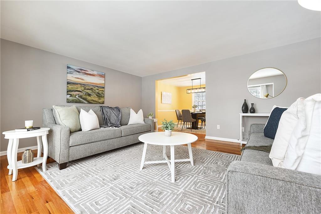 1608 Seegar Road Pittsburgh, PA 15241 - Photo 4 of 23 a living room with furniture and a wooden floor