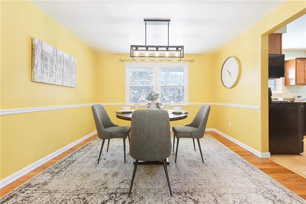 1608 Seegar Road Pittsburgh, PA 15241 - Photo 5 of 23 a view of a dining room with furniture wooden floor and a carpet