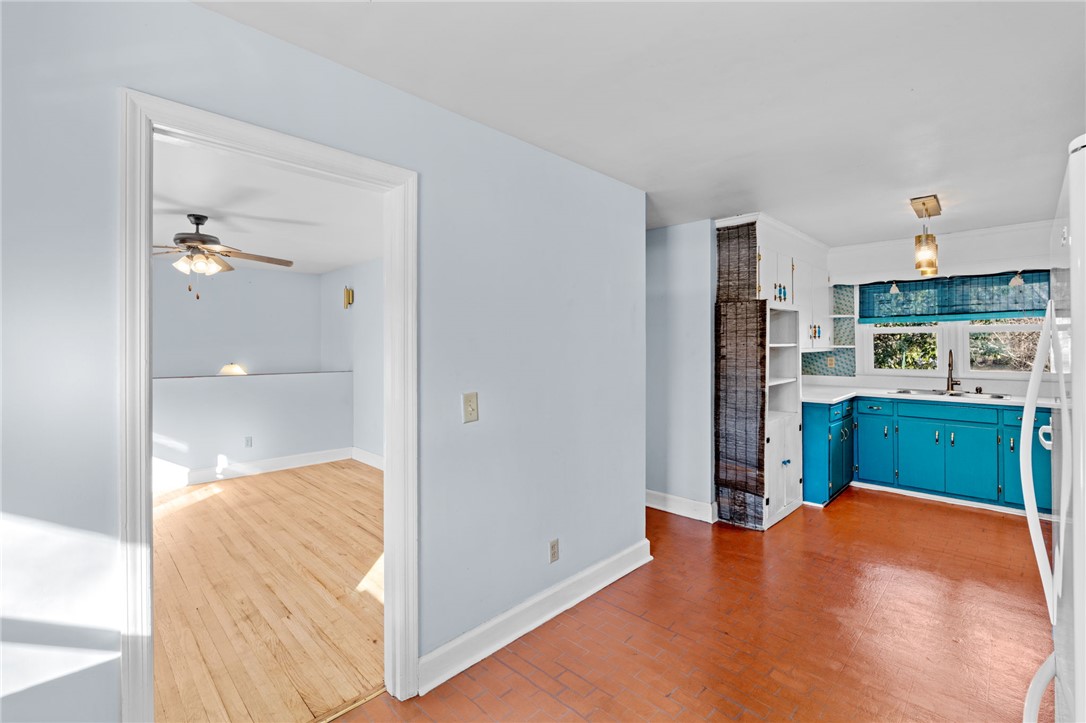 420 Brock Street Central, SC 29630 - Photo 12 of 45 This bright space features a well-equipped kitchen and an inviting room with wood floors.