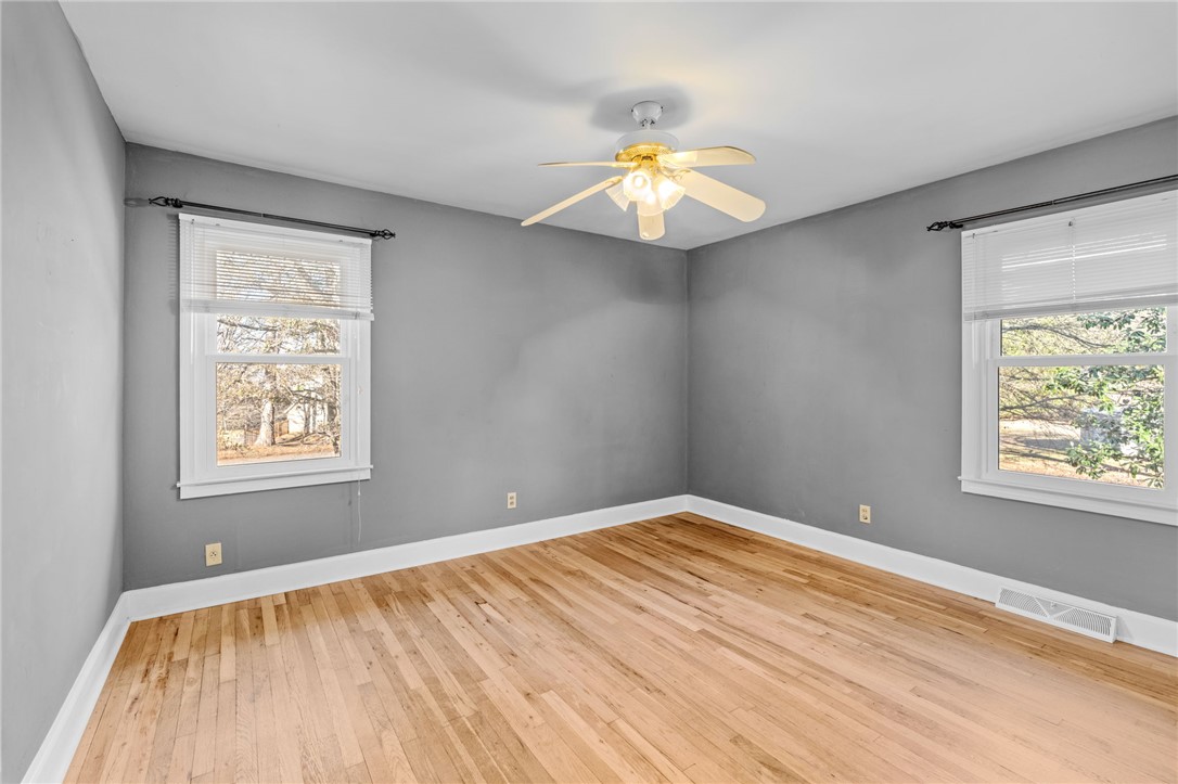 420 Brock Street Central, SC 29630 - Photo 22 of 45 This spacious room features hardwood floors and ample natural light, perfect for comfortable living.