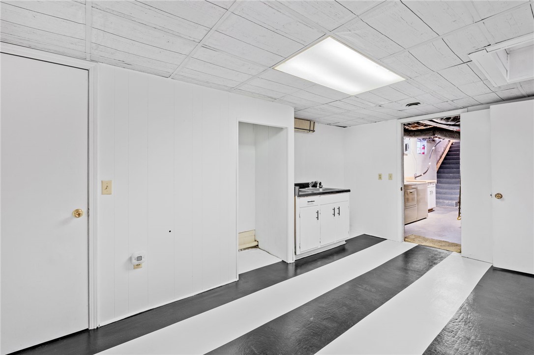 420 Brock Street Central, SC 29630 - Photo 28 of 45 This spacious basement offers a functional laundry area and access to additional storage.