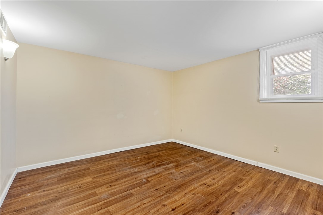 420 Brock Street Central, SC 29630 - Photo 30 of 45 This bright and airy room features sleek hardwood flooring and a single window offering natural light.