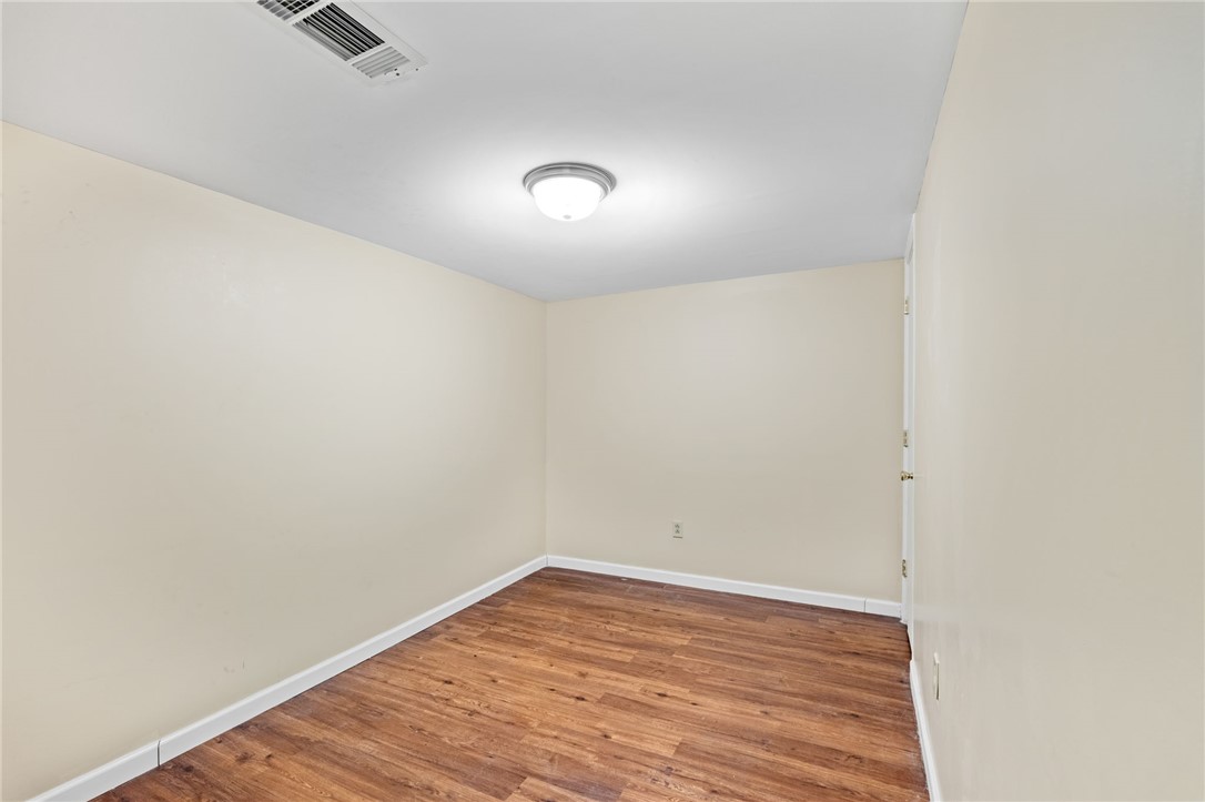 420 Brock Street Central, SC 29630 - Photo 32 of 45 This cozy room features durable wood flooring and a classic ceiling light fixture.