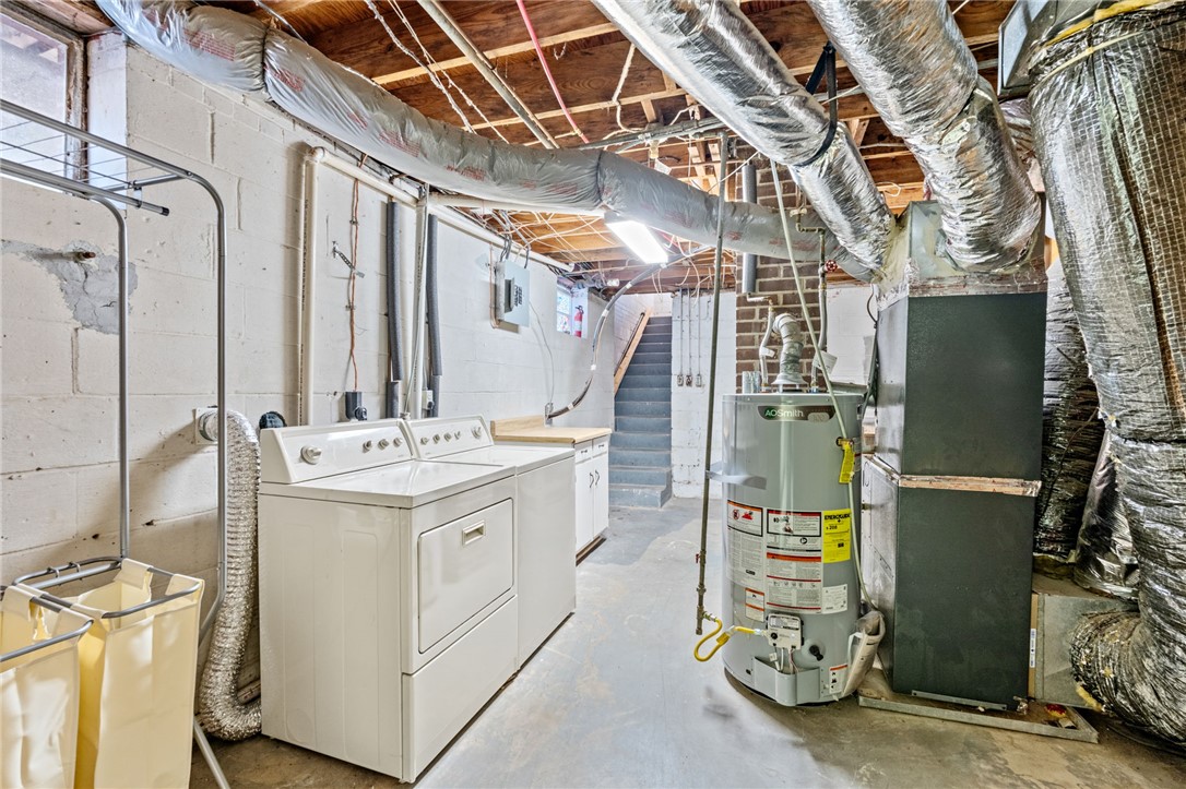 420 Brock Street Central, SC 29630 - Photo 33 of 45 This functional basement provides a versatile space for laundry and storage.