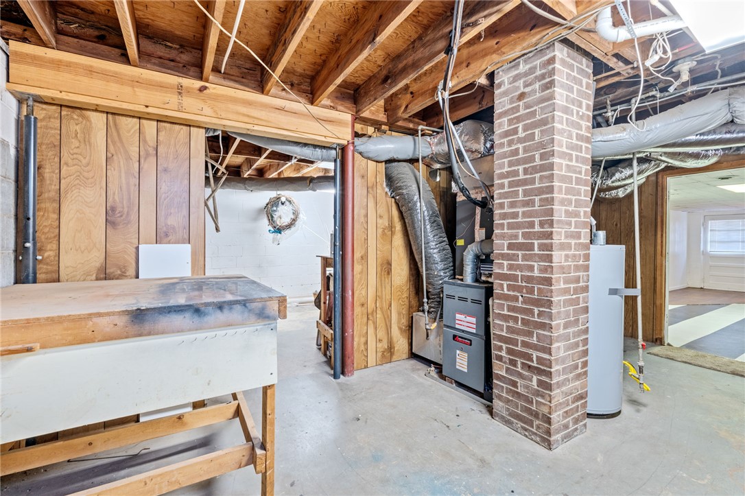 420 Brock Street Central, SC 29630 - Photo 34 of 45 This versatile basement space offers ample storage and potential for future customization.