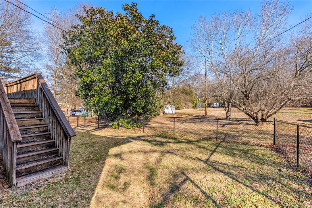 420 Brock Street Central, SC 29630 - Photo 36 of 45 This spacious backyard offers privacy and room for outdoor activities.